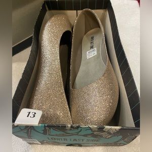 Lower East Side women’s 13 gold glitter ballet flats.